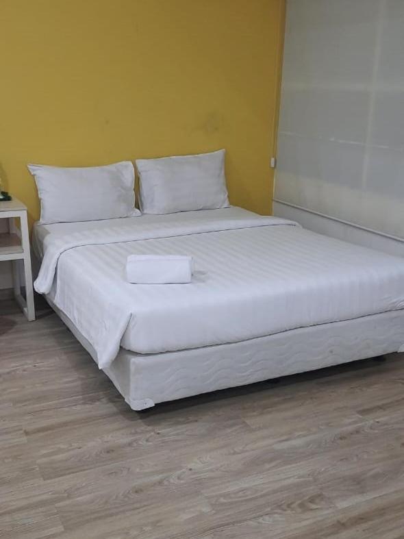 Catania Inn Палембанг Екстериор снимка
