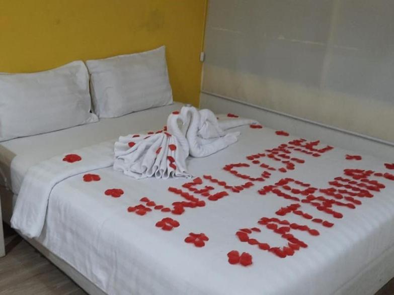 Catania Inn Палембанг Екстериор снимка